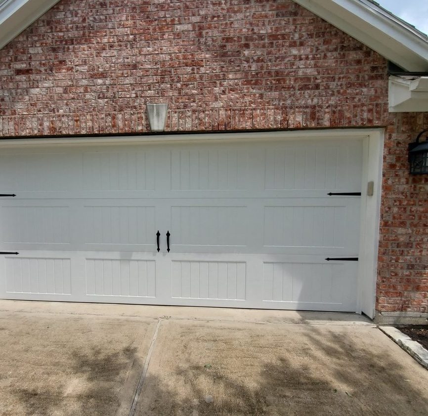 White sectional garage door at a residential home