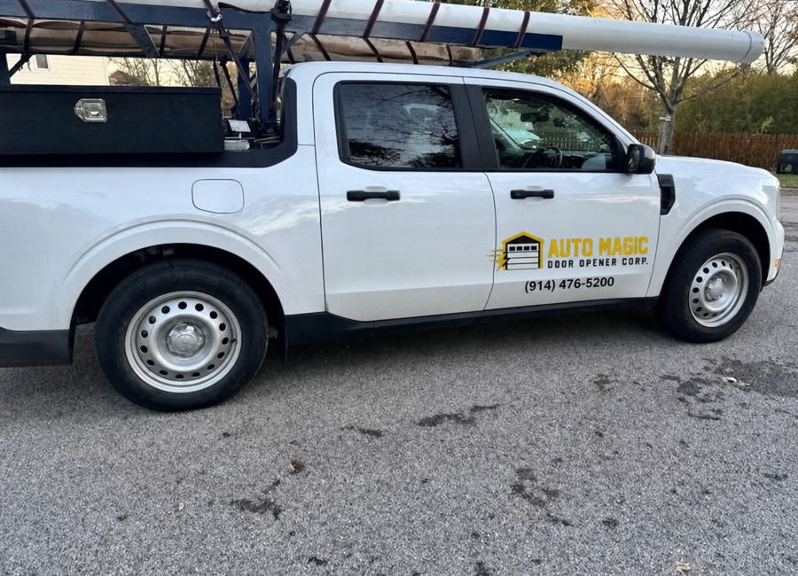 Auto Magic Door Opener service pickup with ladder rack