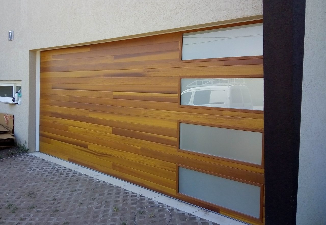 Newly installed white insulated garage door